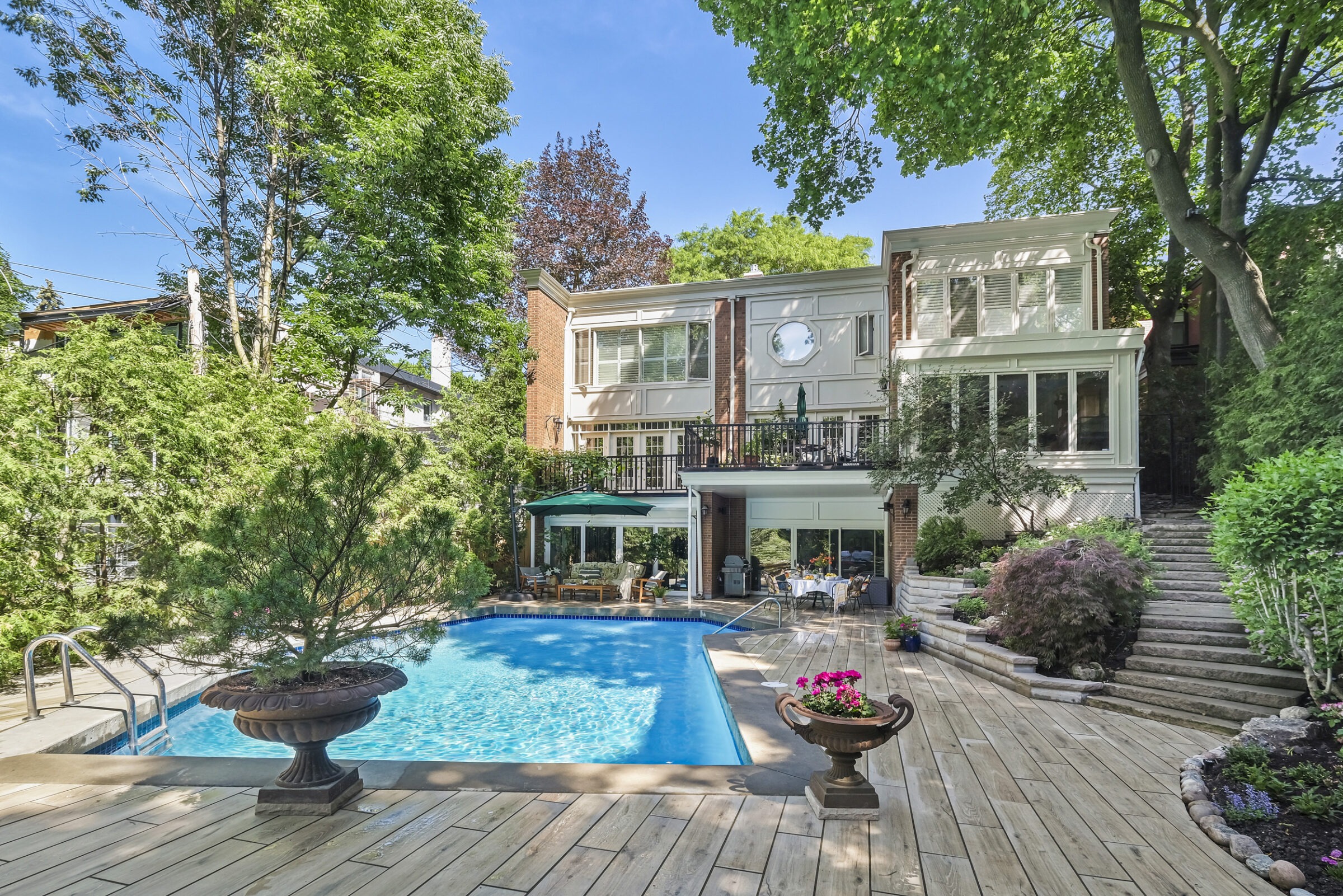 A beautiful backyard pool with a geometric design.